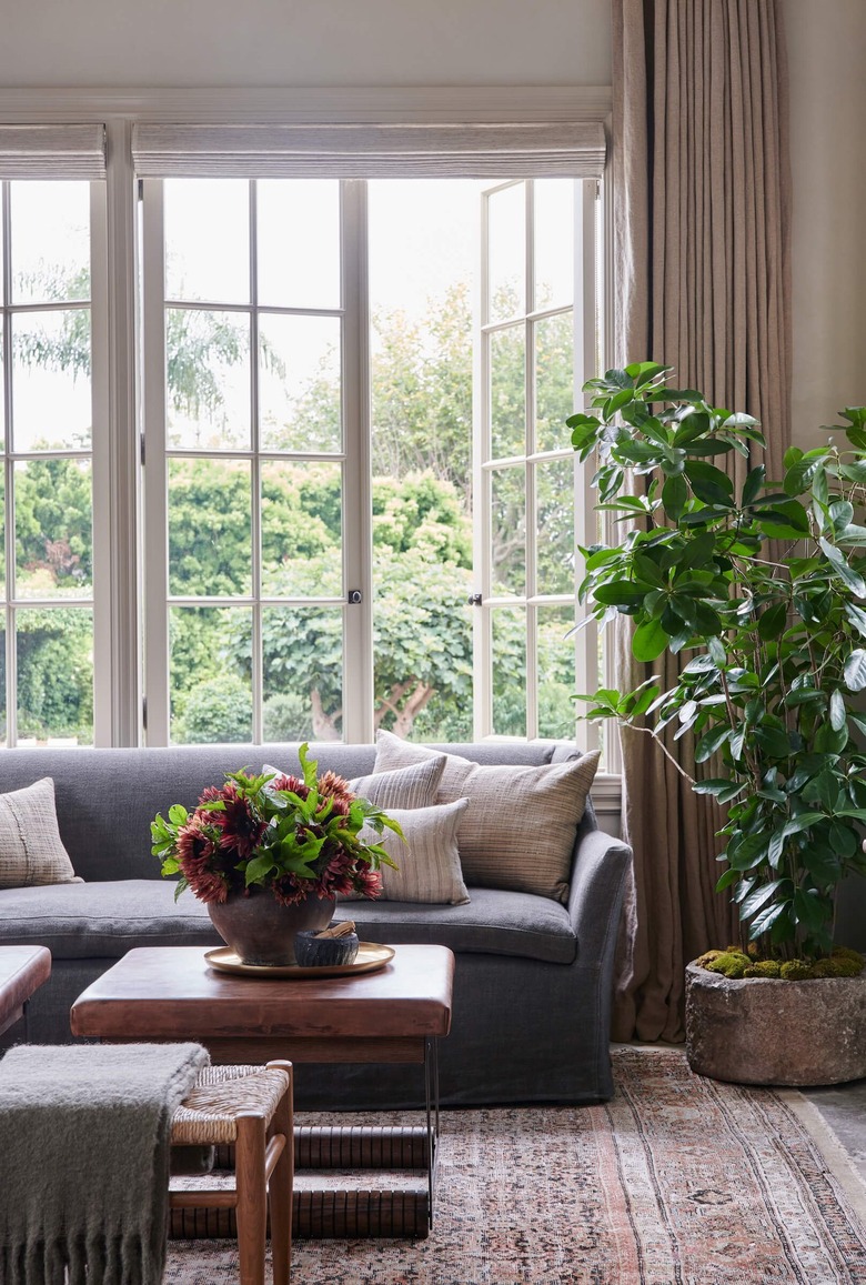French country living room with fresh flower arrangement