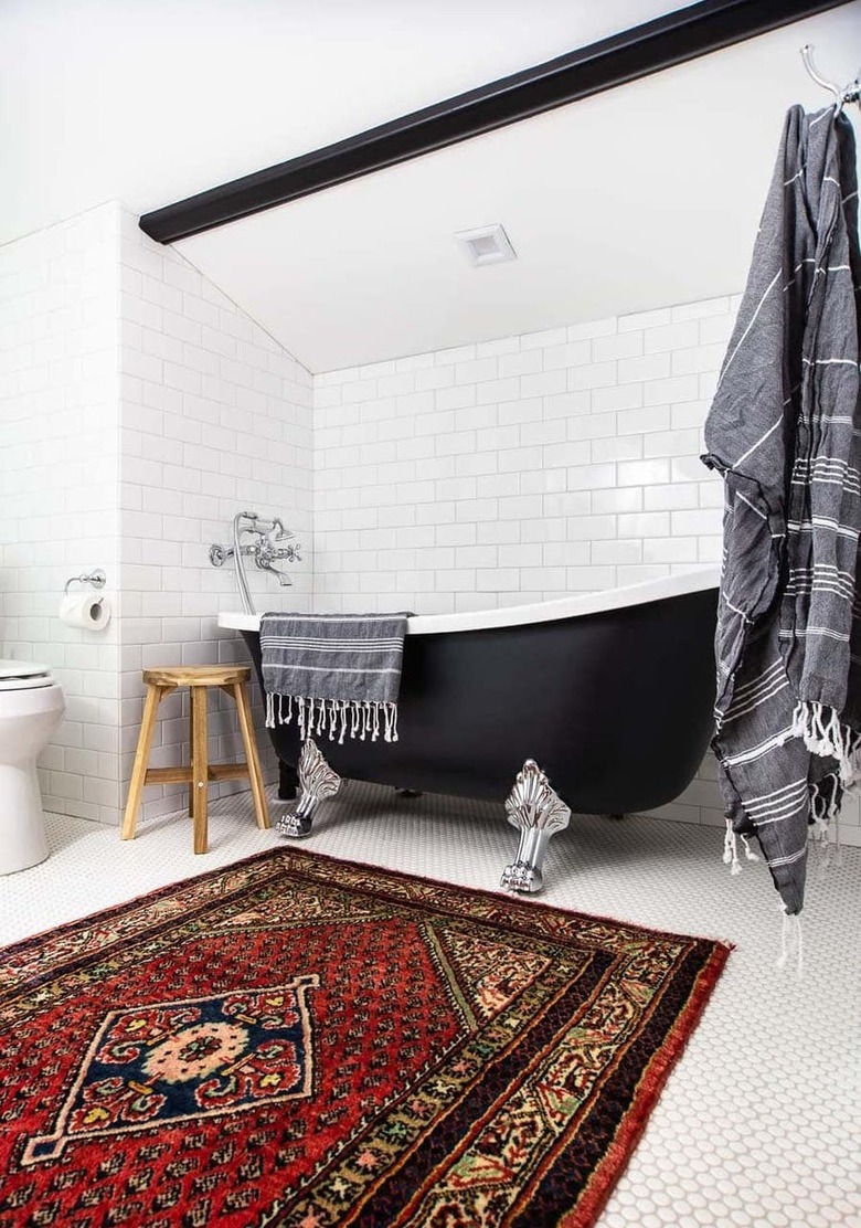 Industrial bathroom with freestanding tub