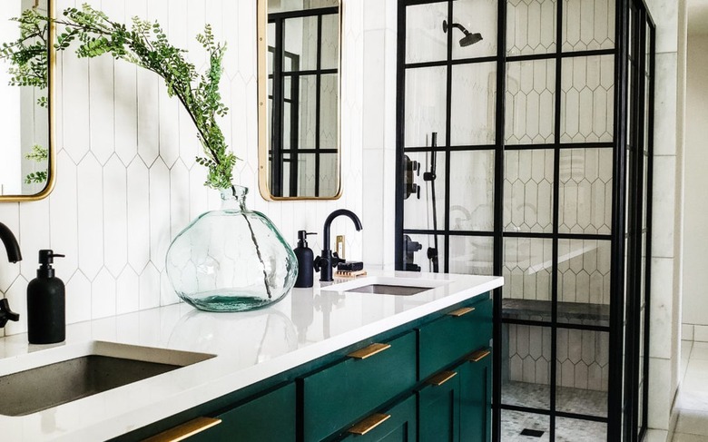Industrial bathroom with black paneled shower door