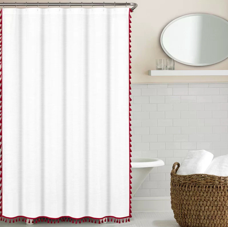 Red tasseled shower curtain