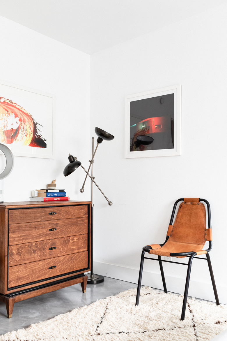 bedroom with floor lamp in corner