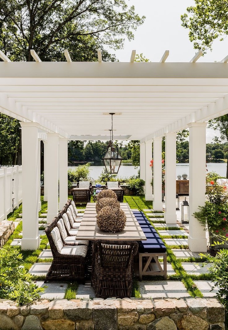 White wide-slatted open roof pergola