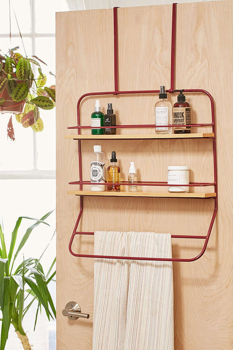 Urban Outfitters storage rack on door.
