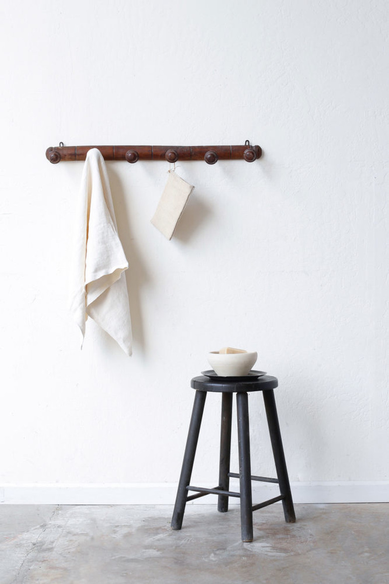 round wooden accent stool in black