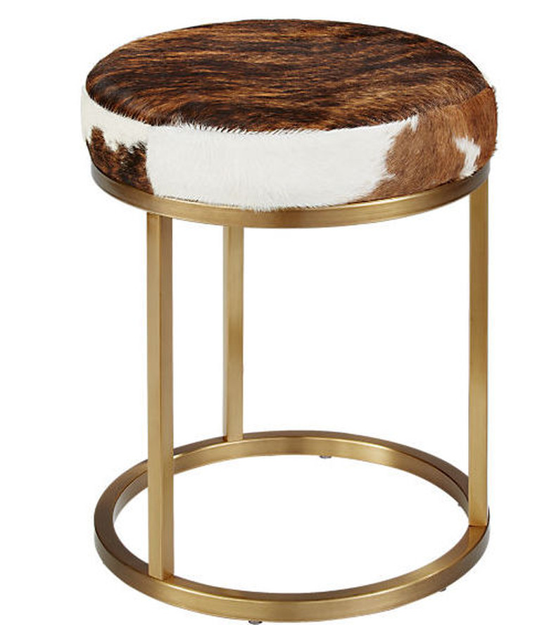 brass accent stool with cowhide seat