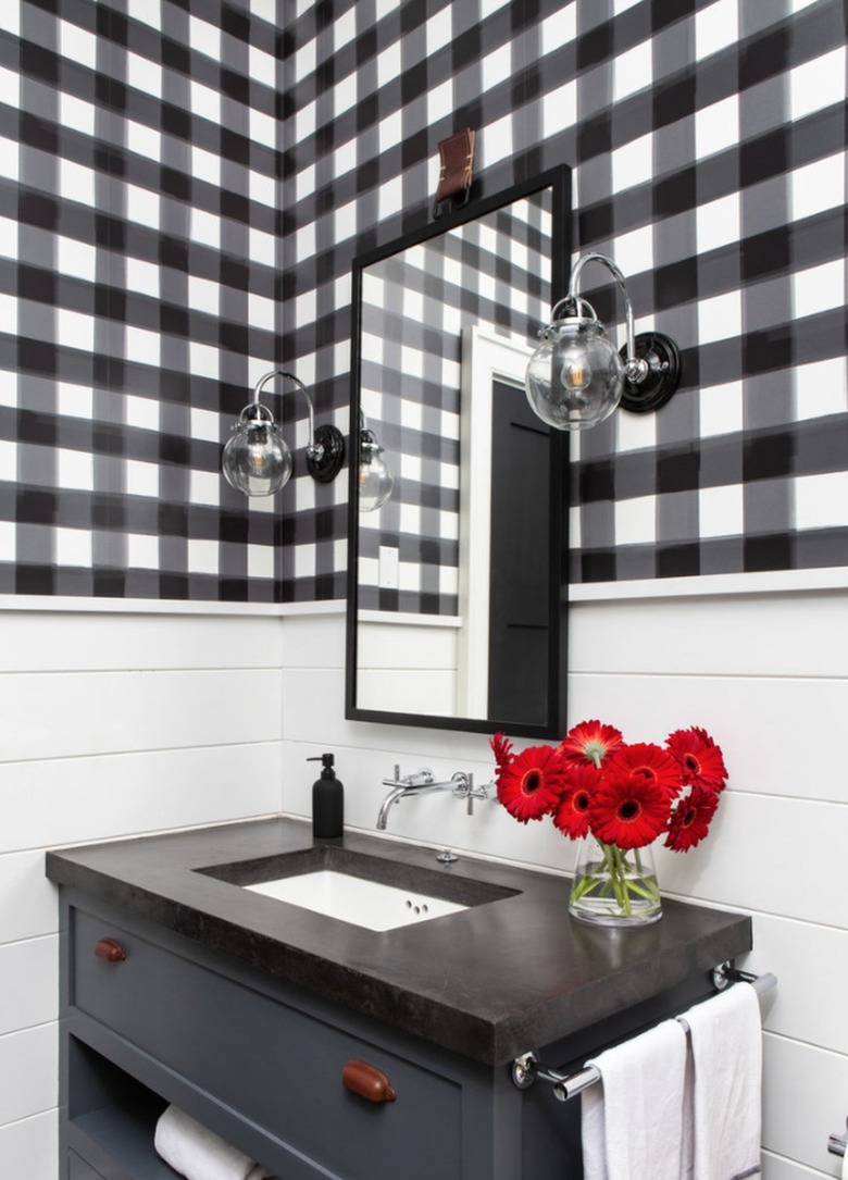 Bathroom with black and white checked wallpaper