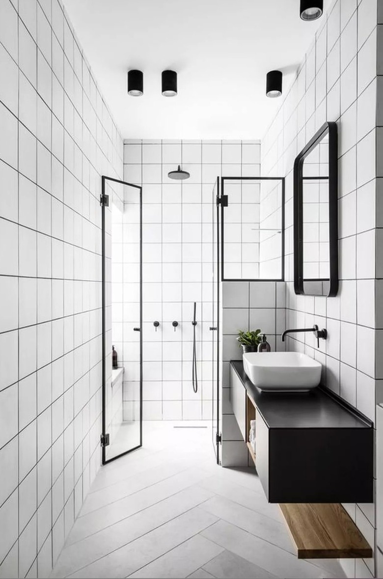 dark grout in white bathroom