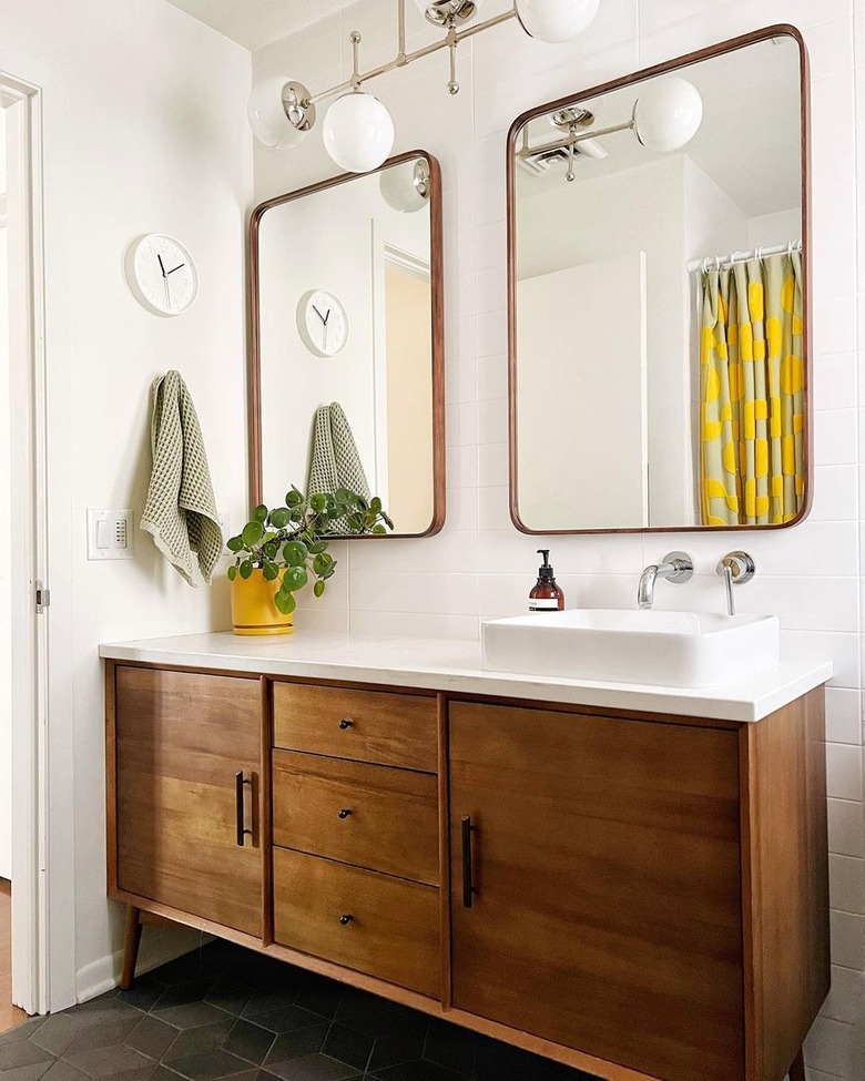 midcentury bathroom with warm wood vanity
