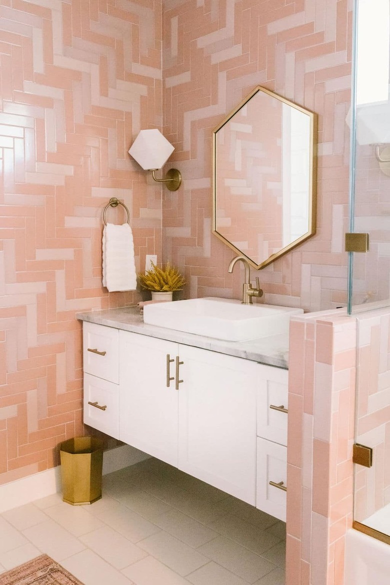 midcentury bathroom with pink mosaic tiles