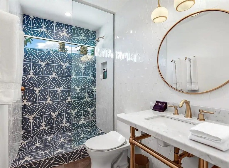 midcentury bathroom with blue starburst hex tiles