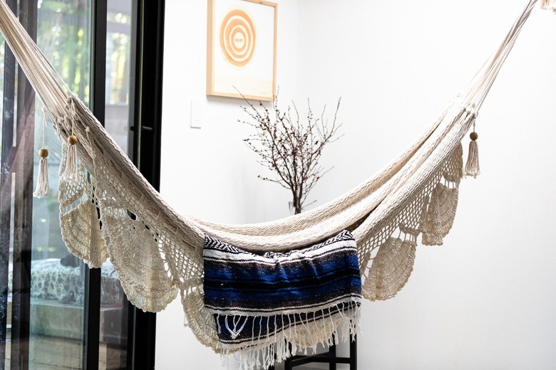 hammock hanging in corner of living room
