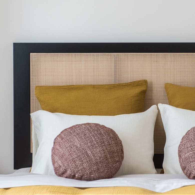 black wood and woven headboard