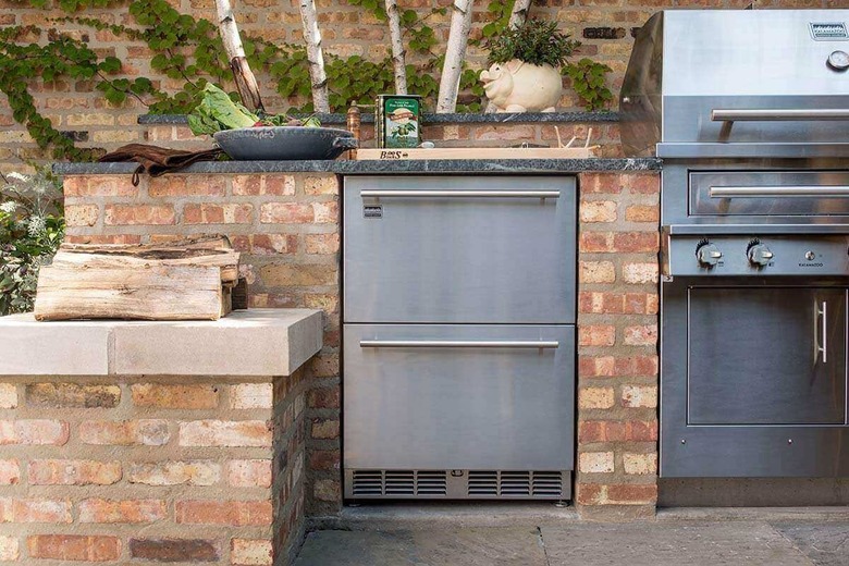 brick outdoor kitchen idea with stainless steel refridgerator