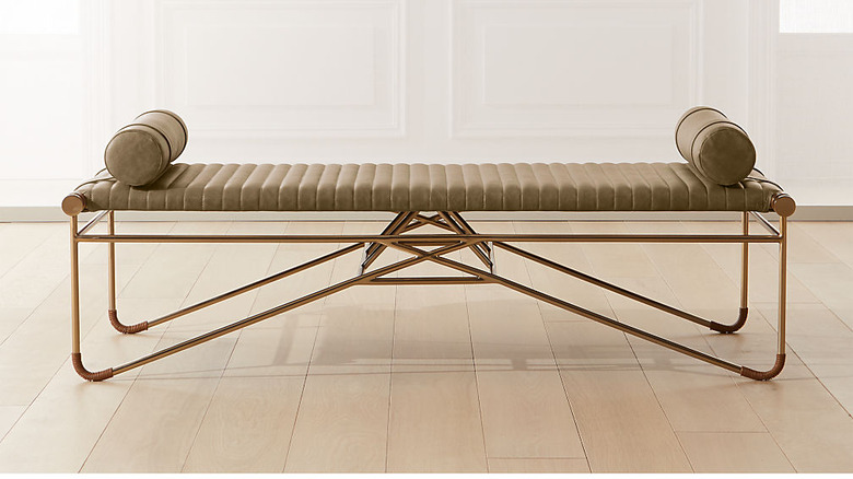 la strizza saddle leather bench with bolster pillows