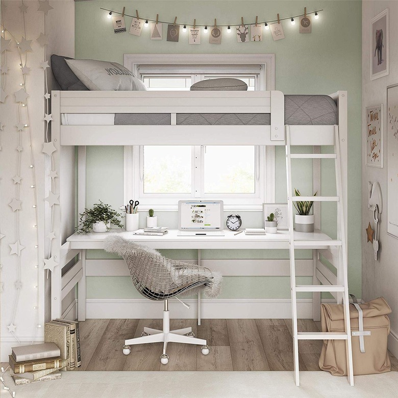 bedroom office idea with white loft bed with a desk underneath in a light green bedroom