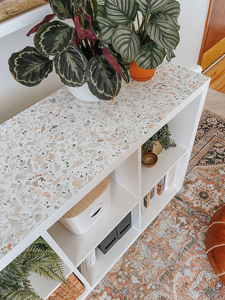 terrazzo removable wallpaper covering bookcase