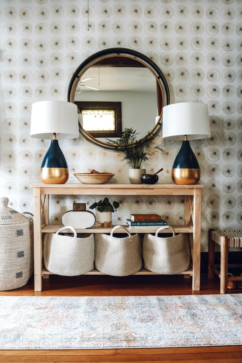 entryway with removable wallpaper on wall