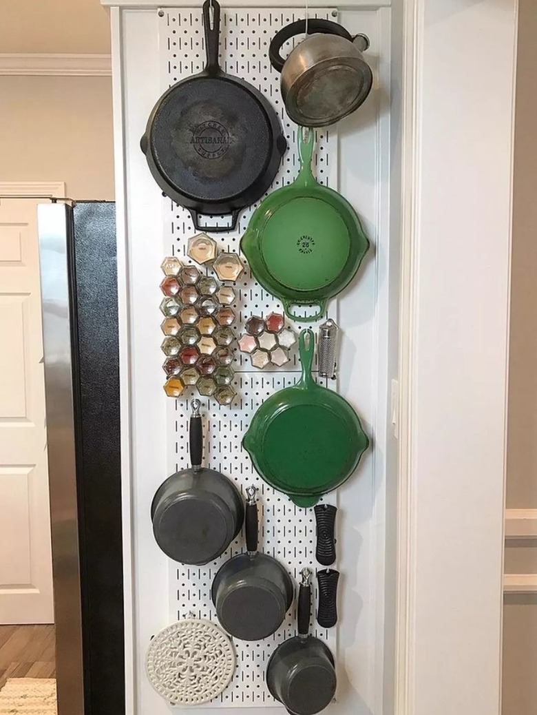 Spices stored with pots and pans
