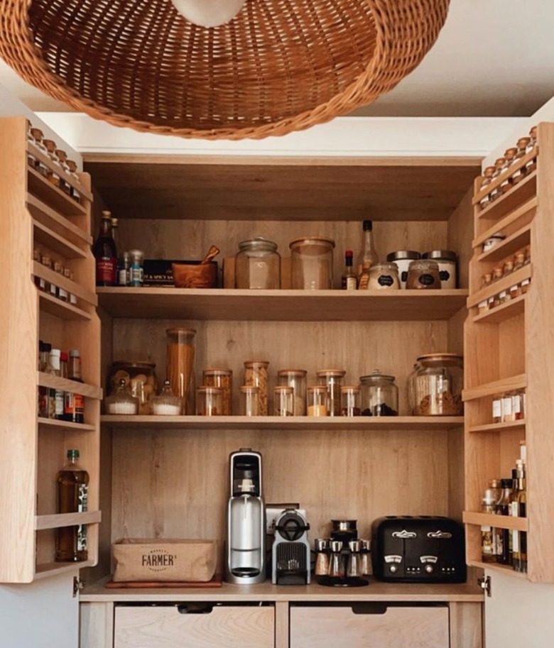 Pantry cabinet with shelves on doors