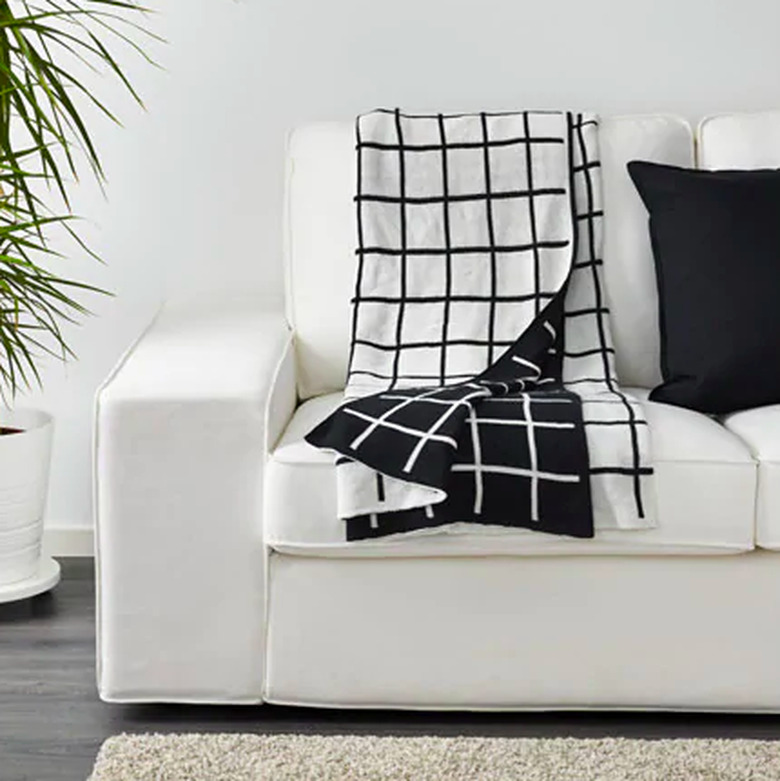 black and white throw blanket on white sofa