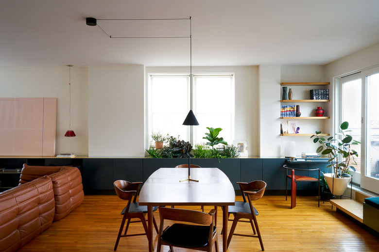 dining room with green cabinets