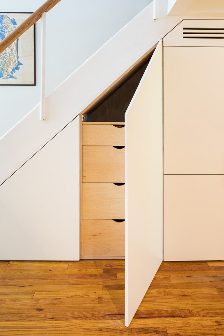 built in storage under stairs