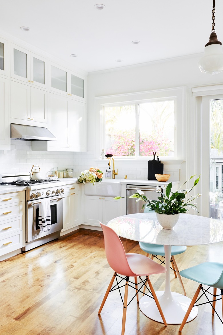 white kitchen with marble countertops