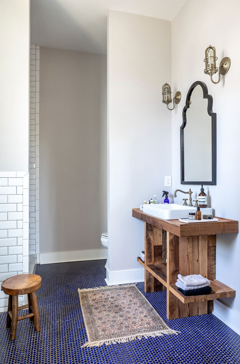 Master bathroom with blue floor tile