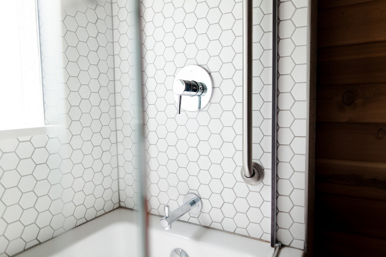 white hexagon tile shower