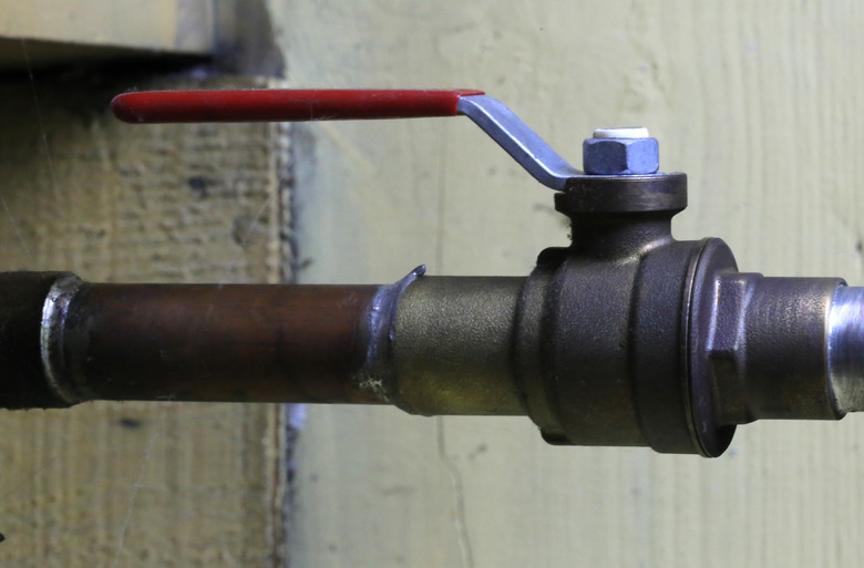 Cloe-up of a water valve in a copper pipe