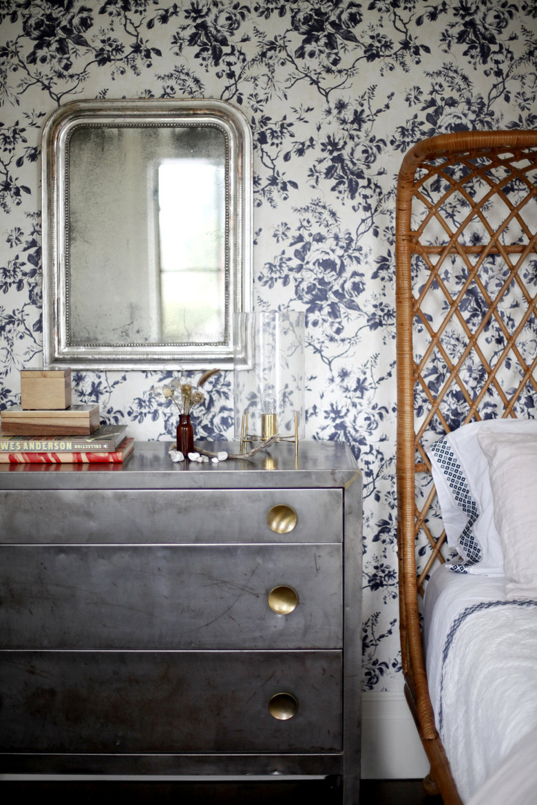 bohemian bedroom with floral wallpaper