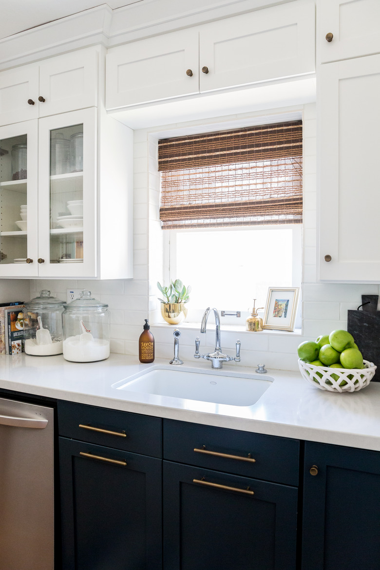 kitchen with white and blue cabinets