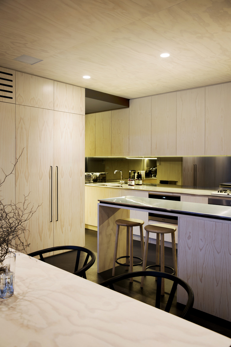 Kitchen with all plywood cabinets and ceiling.