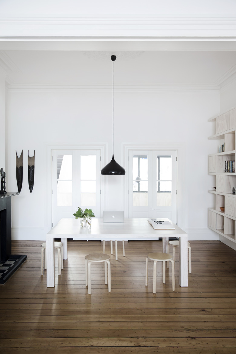 Office with white table and stools.