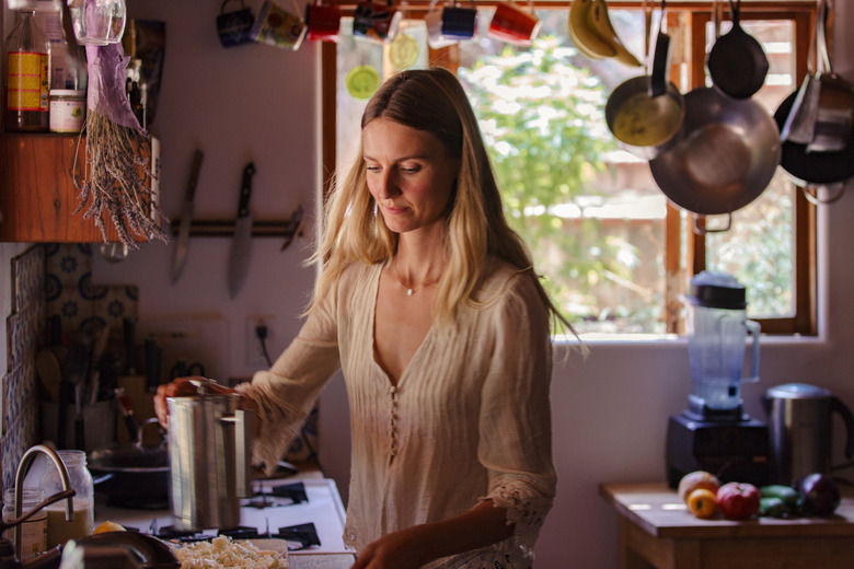 Shot of Colleen prepping in the kitchen