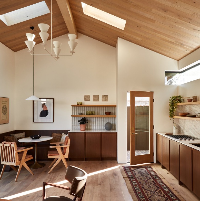 interior of ADU with a breakfast nook and shelves along the wall