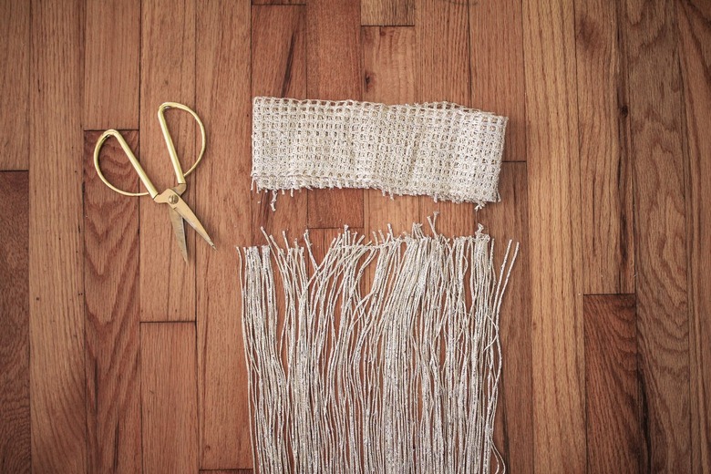 Gold scissors with curtain fringe