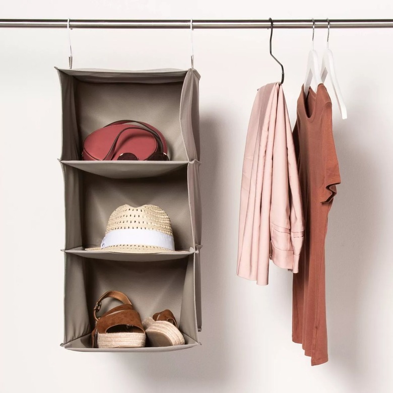 hanging closet organizer next to hanging clothing
