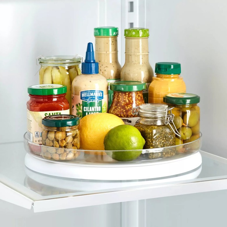 turntable organizer in fridge with condiments