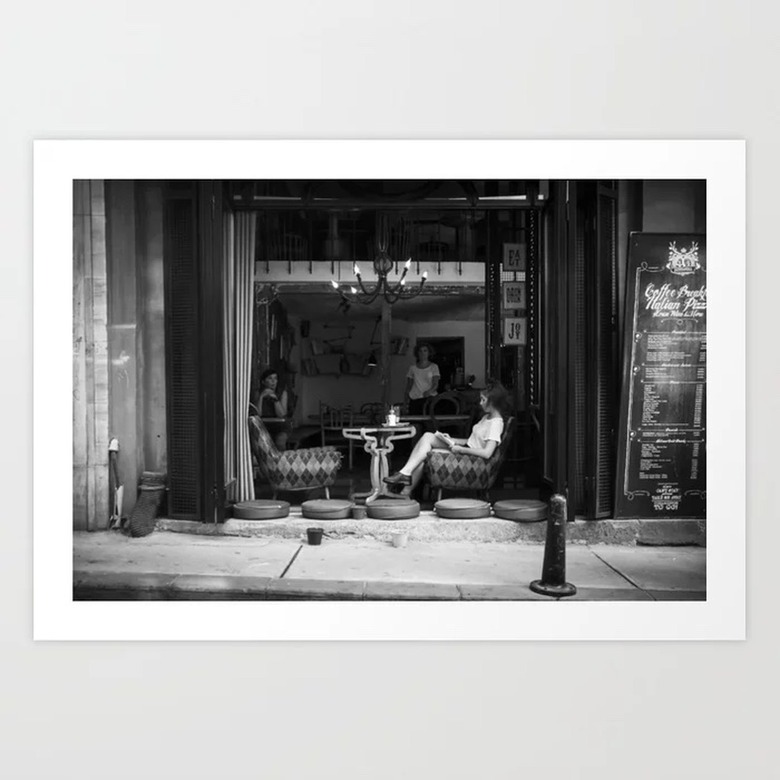 black and white print of someone at coffee shop