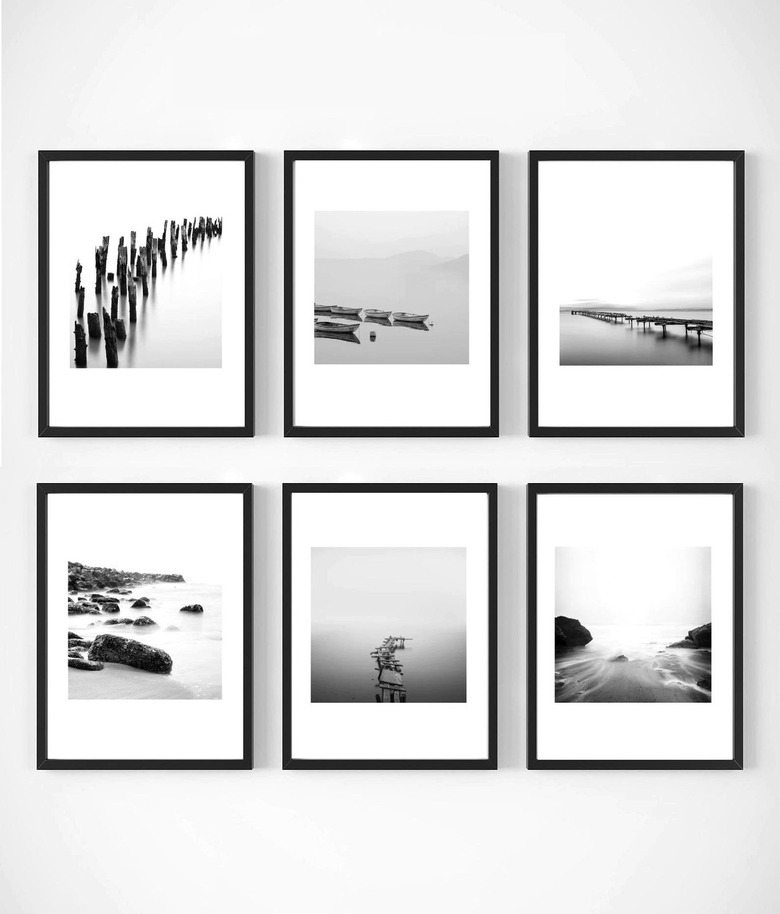 six framed coastal photographs