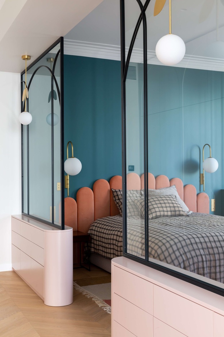 The parents' pink and teal bedroom.