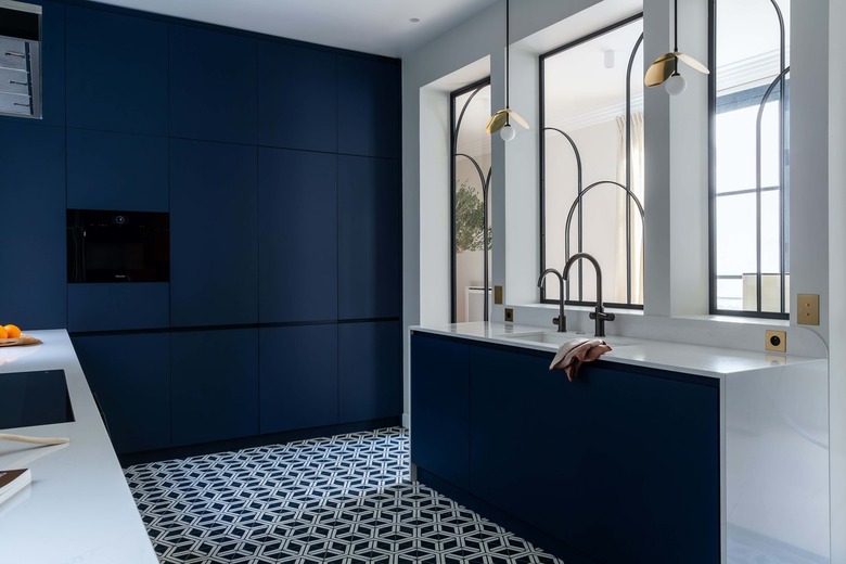 The blue kitchen of a Paris apartment.