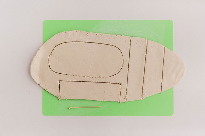 Cut out shapes with a toothpick or needle tool.