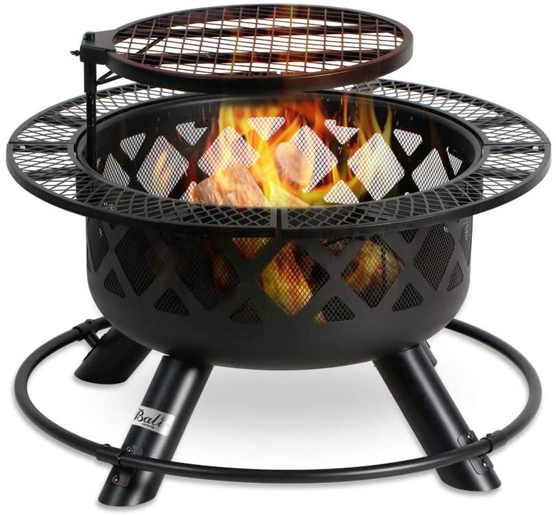 black fire pit with cooking grill
