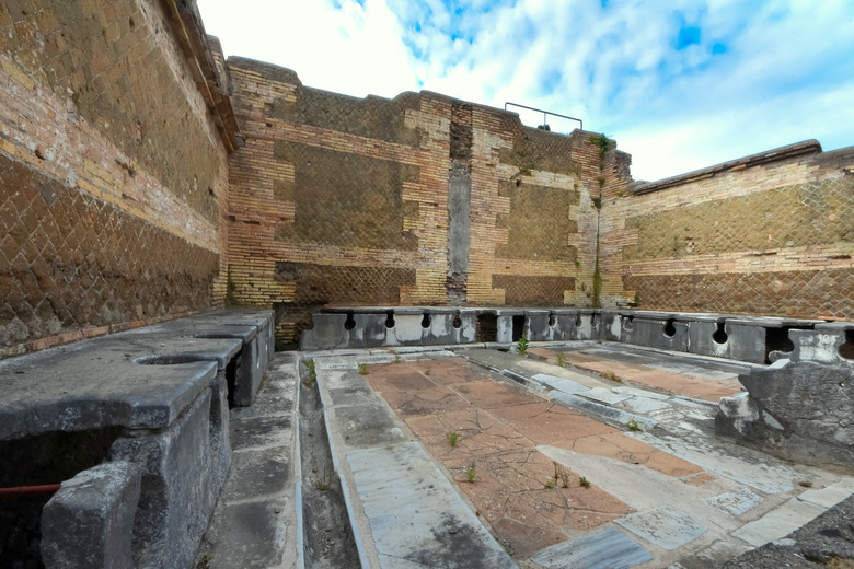 Roman toilets latrines in Ostia Antica near Rome in Lazio