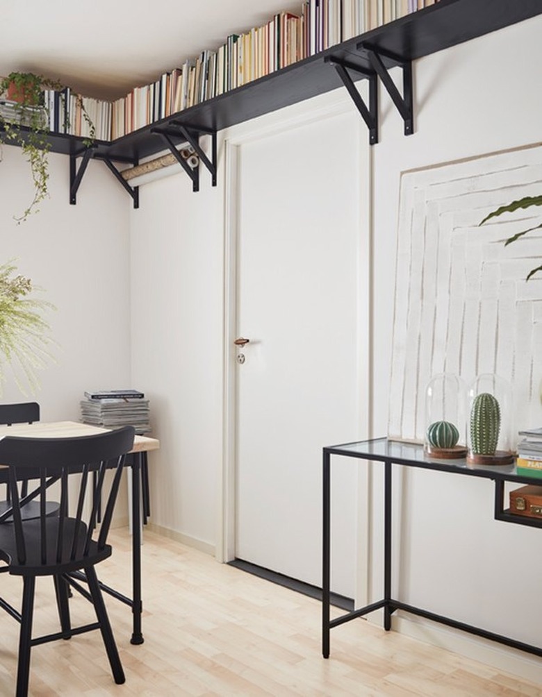 room with high-up bookshelves for Apartment decorating ideas