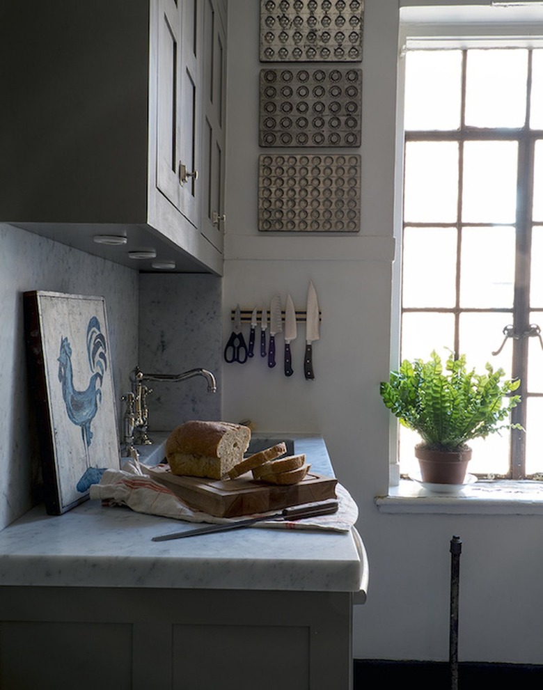 kitchen with magnetic knife holder on wall