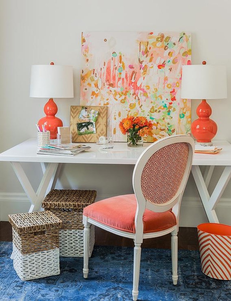 desk area with chair and trash can as apartment decorating ideas