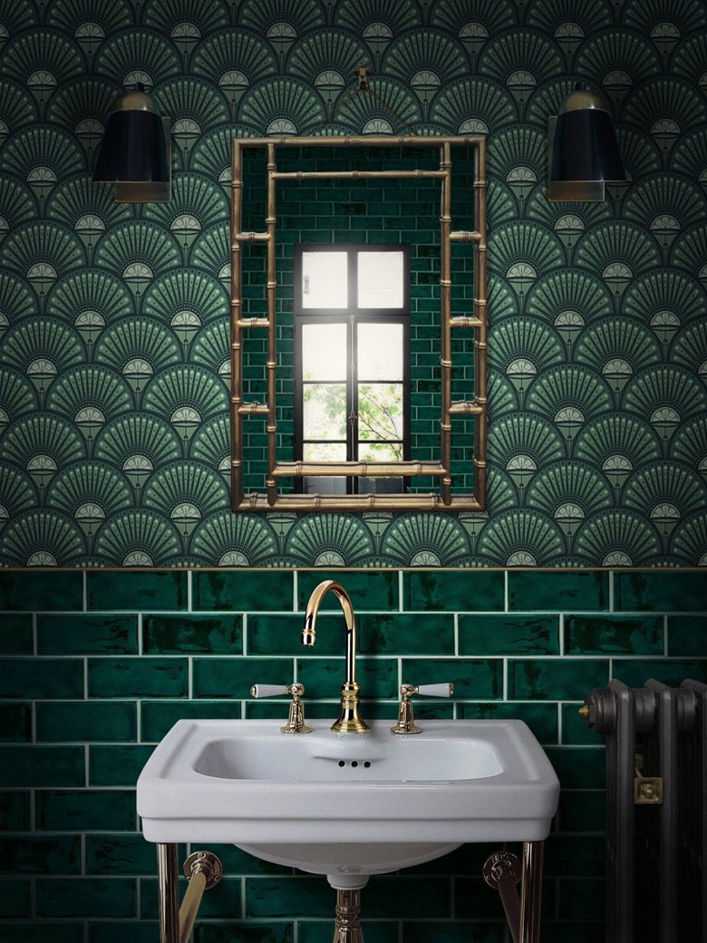 art deco bathroom by Divine Savages with patterned wallpaper and subway tile